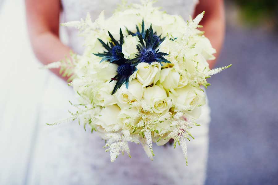 blue white wedding bouquet thistle